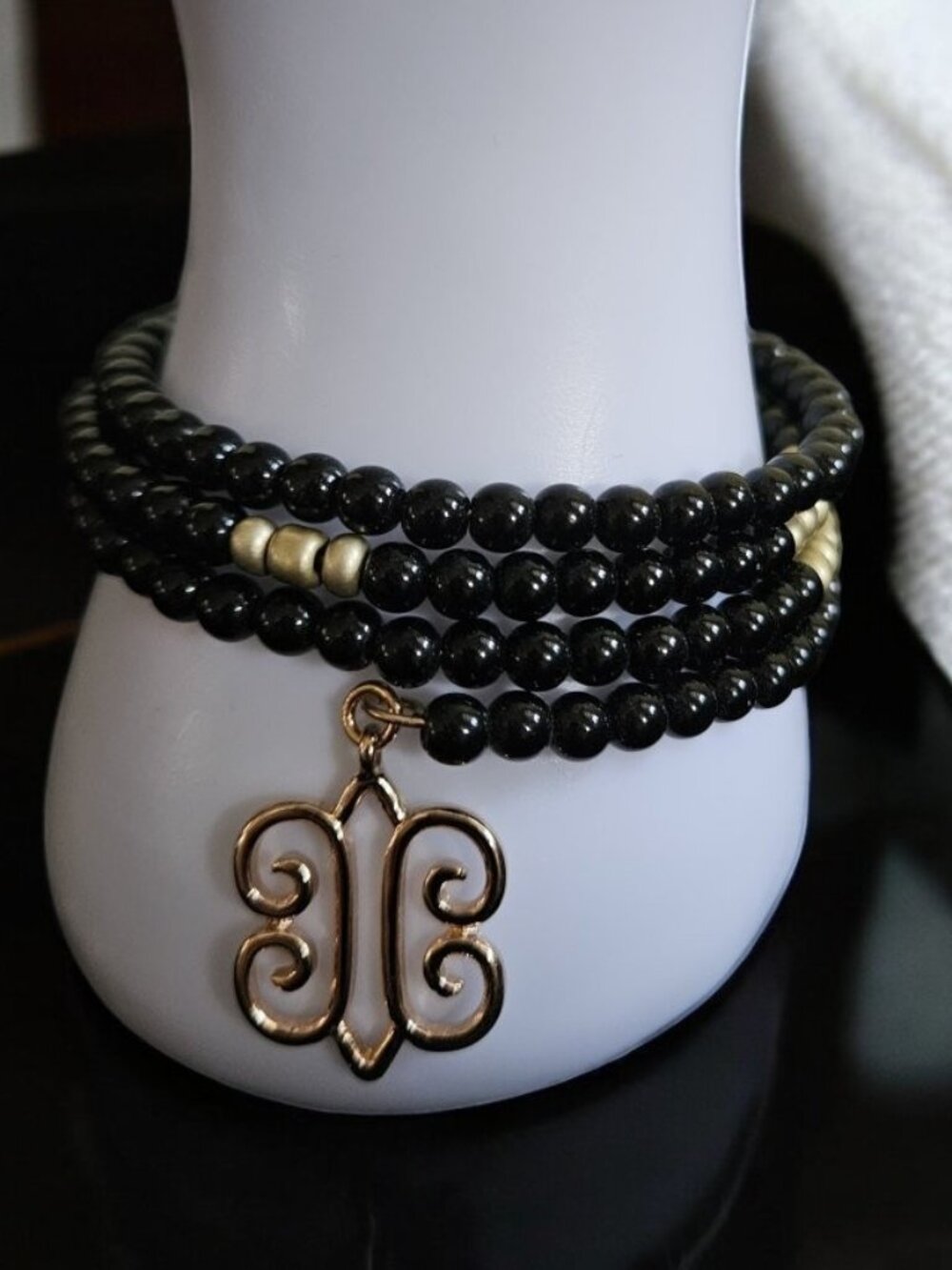 AVON Black and Goldtone Beaded Wrap Bracelet with Charm